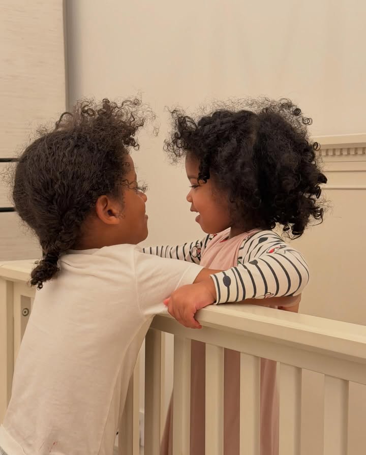 May be an image of baby, people kissing and text