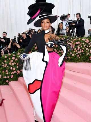 May be an image of gown and text