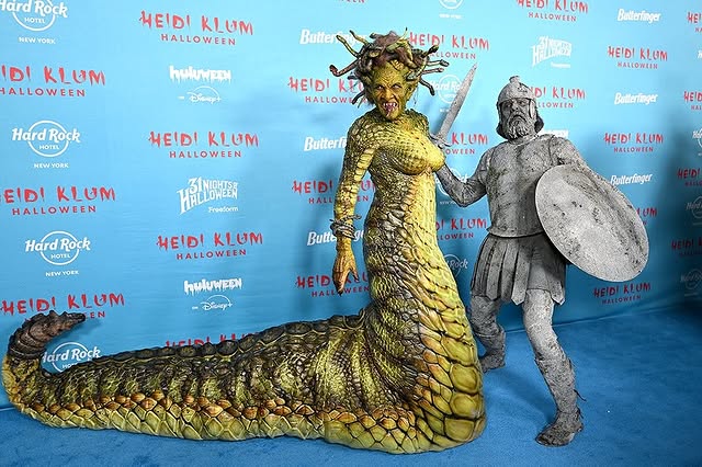 May be an image of seahorse, costume and statue