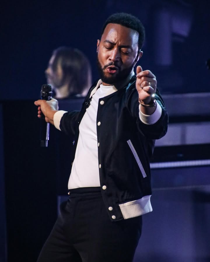 May be an image of one or more people, microphone, tambourine, concert and text