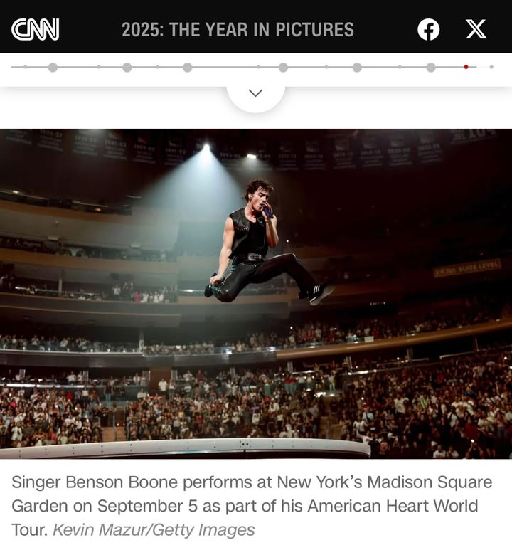 May be a Twitter screenshot of ‎standing, magazine and ‎text that says '‎کن 2025: H YEARIN IN PICTURES f X Singer Benson Boone performs at New York s Madison Square Garden on September 5 as part of his American Heart World Tour. Kevin Mazur/Getty Images‎'‎‎