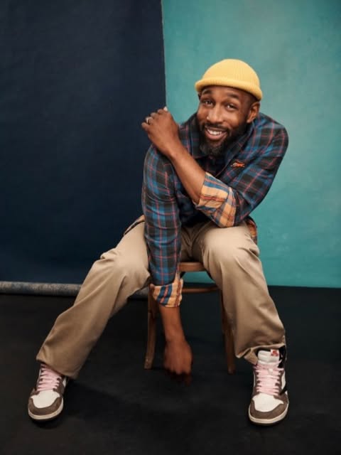 May be an image of one or more people, beard, wingtip shoes, flannel, beret and text