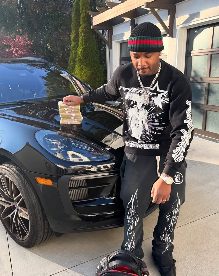 May be an image of sweatsuit and text