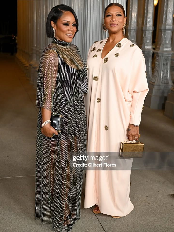 May be an image of one or more people, gown, dress and carpet