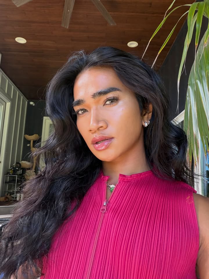 May be a selfie of one or more people, eyeliner, makeup, long hair, knit and text