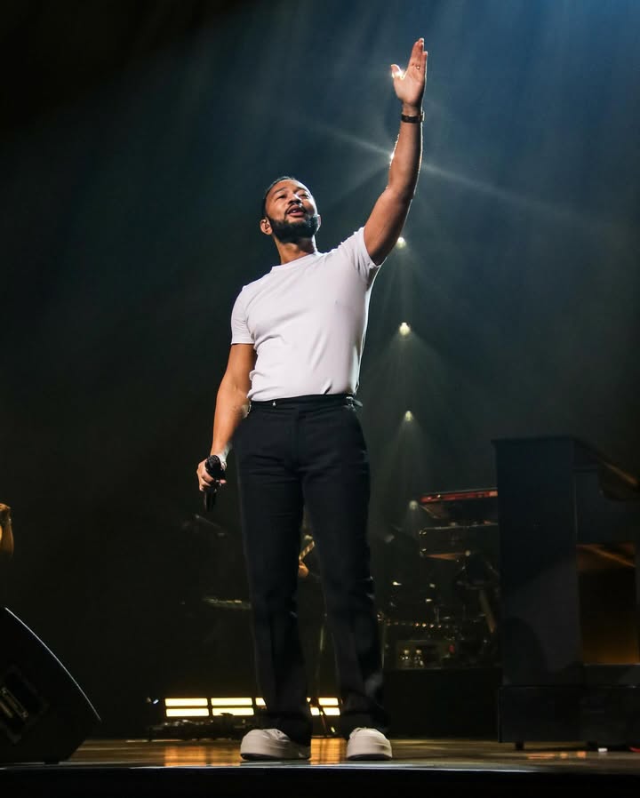 May be an image of microphone, concert and text