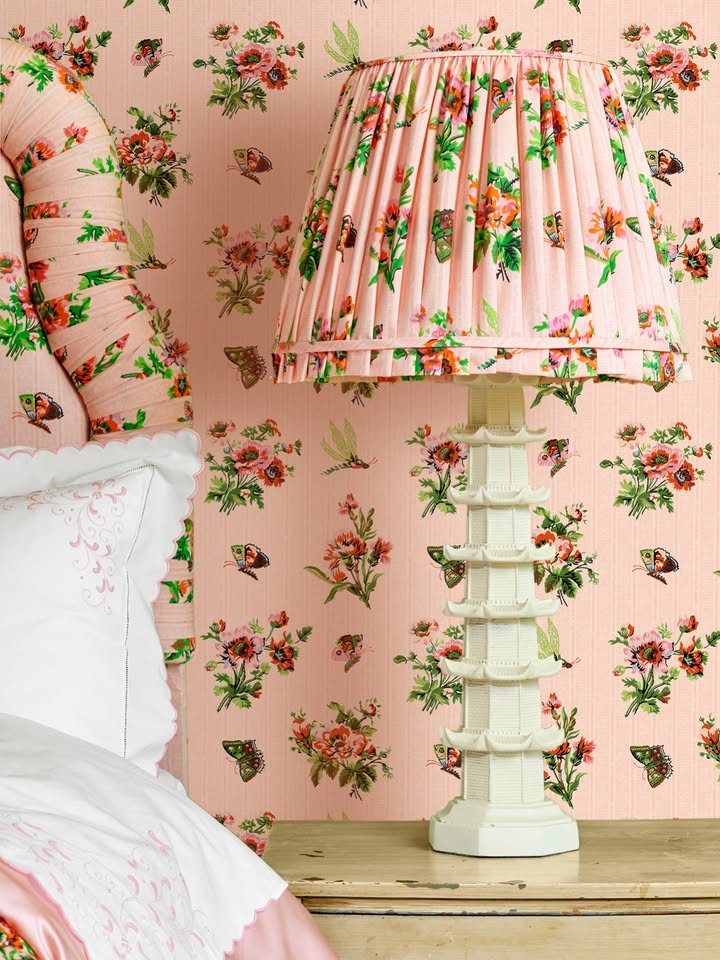 May be an image of lamp, lamp shade, bedroom and text